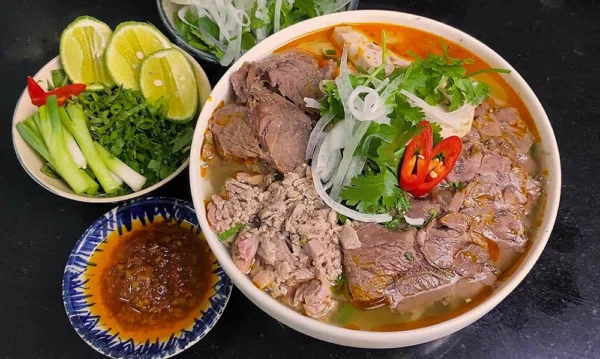 Hue Walking Food Tour (English Guide) - Image 2